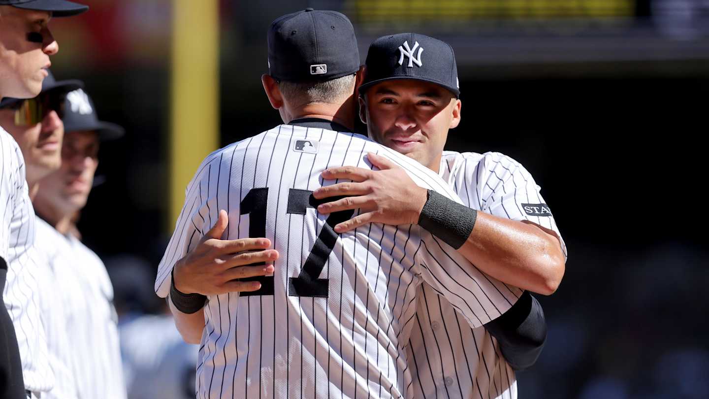 Aaron Boone in the dugout during a Yankees game.