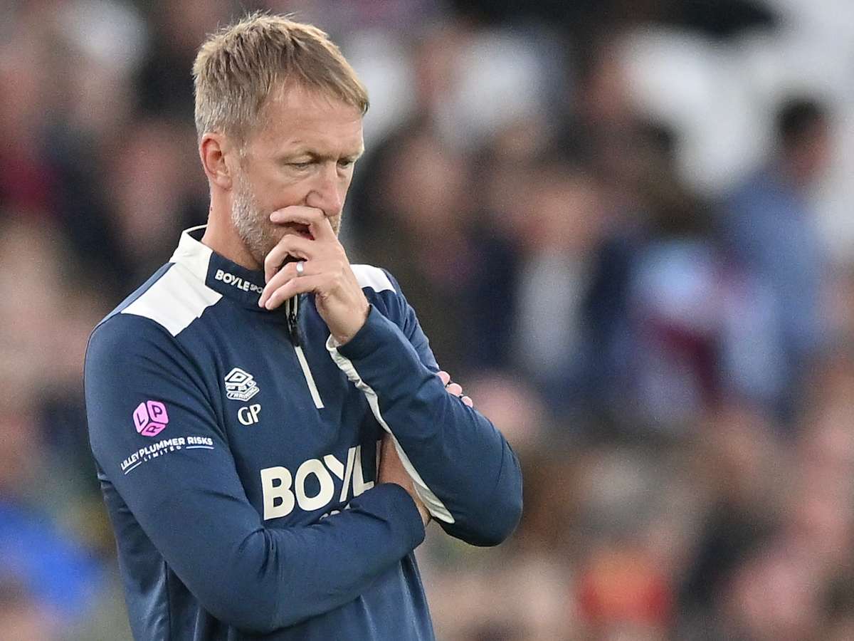 Graham Potter looking dejected on the sidelines.