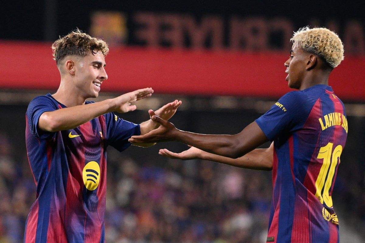 Lamine Yamal and Fermin Lopez on the pitch for Barcelona.