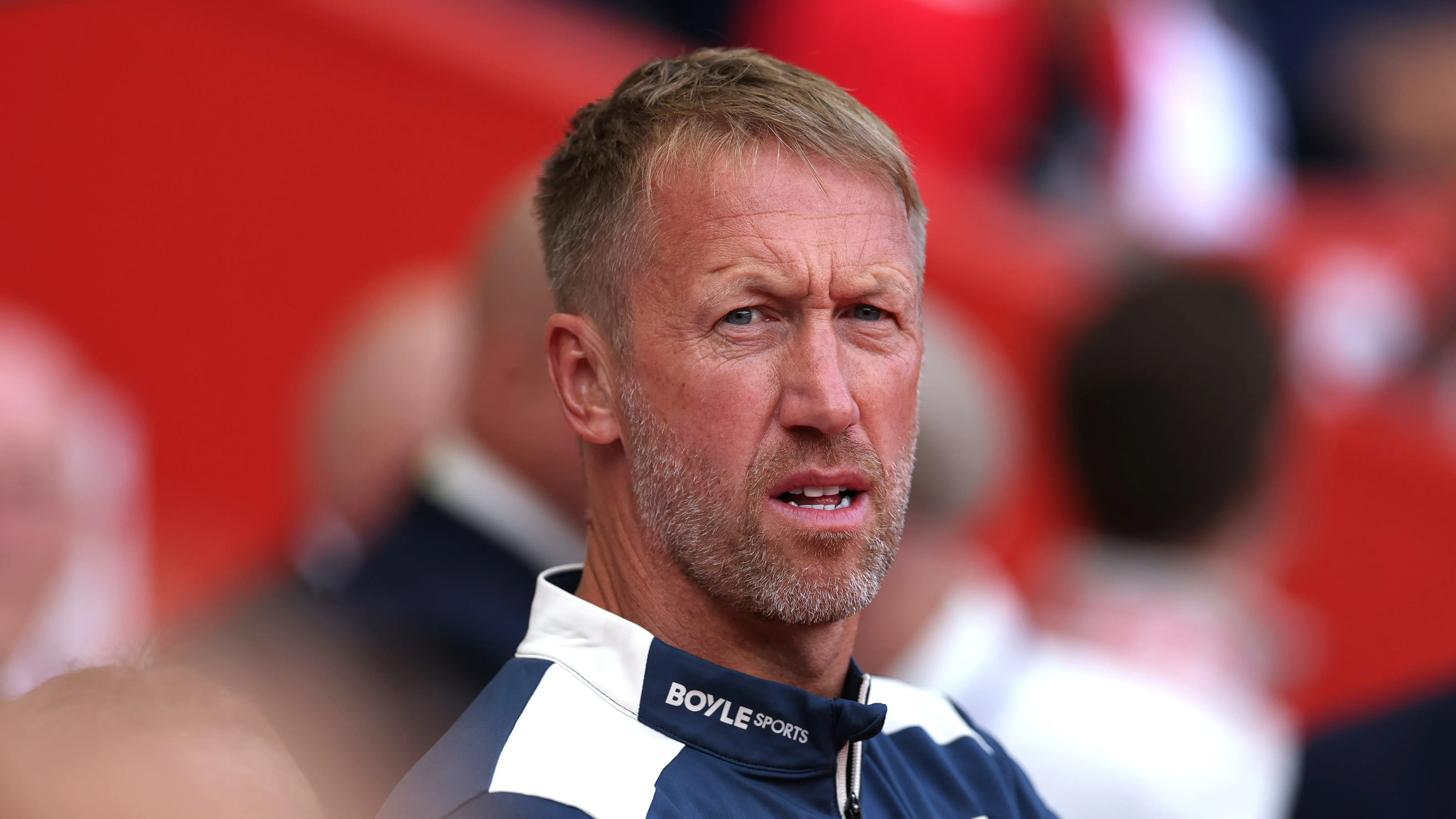 Graham Potter looking stressed during a match.